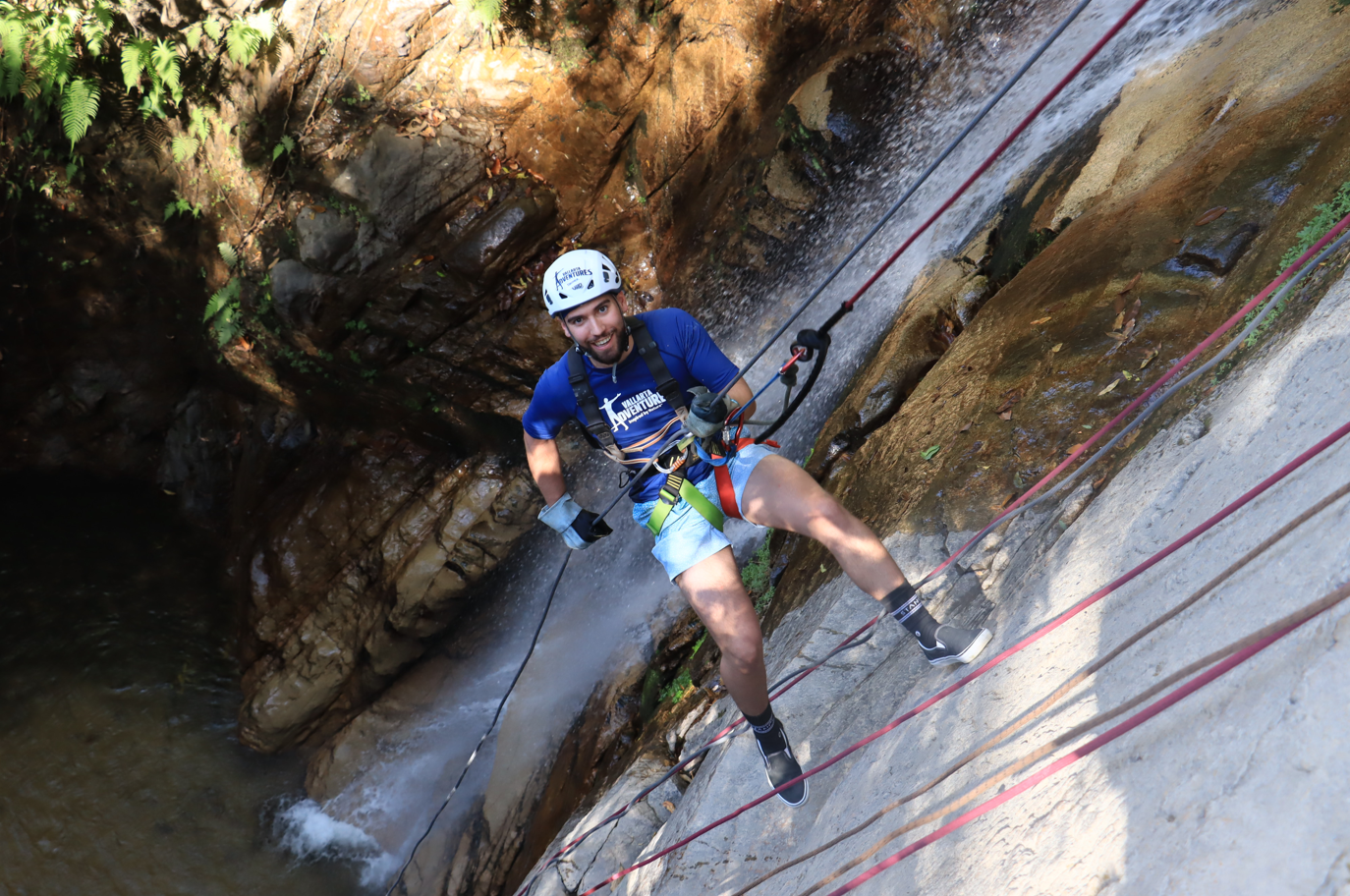 Waterfall rappelling adventure